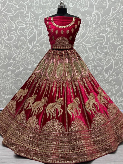 Babelicious Pink Metallic Zari Embroidered Velvet Bridal Lehenga
Semi Stitched