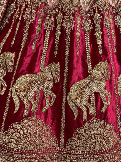 Babelicious Pink Metallic Zari Embroidered Velvet Bridal Lehenga
Semi Stitched