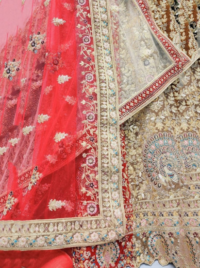 Charismatic Multi-colored Zari Embroidered Velvet Bridal Wear Lehenga Choli