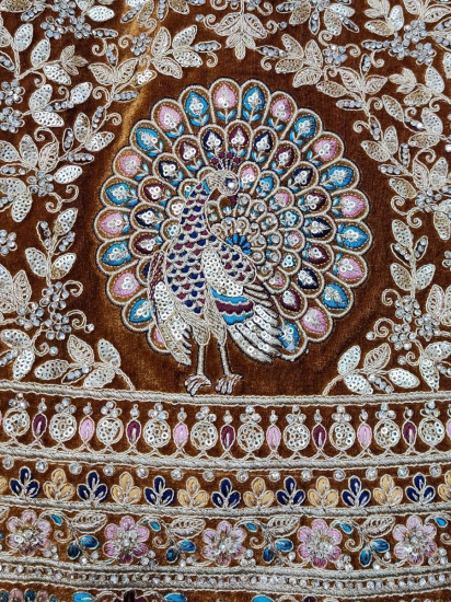 Charismatic Multi-colored Zari Embroidered Velvet Bridal Wear Lehenga Choli