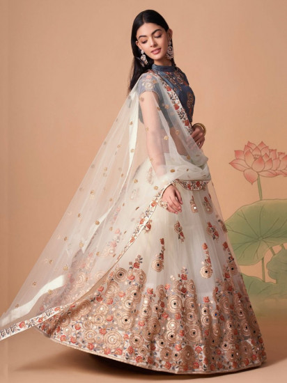 Pretty Ivory Embroidered Net Party Wear Lehenga Choli
Semi Stitched