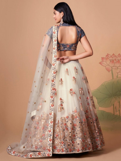 Pretty Ivory Embroidered Net Party Wear Lehenga Choli
Semi Stitched