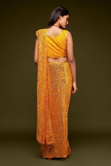 Sabyasachi Yellow Sequins Georgette Party Wear Saree With Blouse(Un-Stitched)