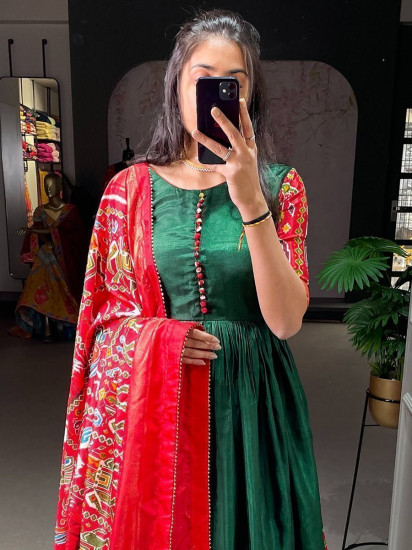 Stunning Dark-Green Patola Print Dola Silk Festive Gown