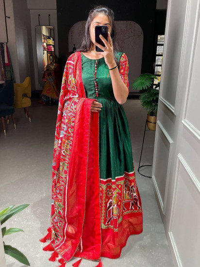 Stunning Dark-Green Patola Print Dola Silk Festive Gown