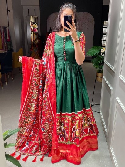 Stunning Dark-Green Patola Print Dola Silk Festive Gown