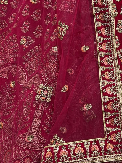 Stunning Rani Pink Zari Work Velvet Bridal Wear Lehenga Choli
Semi Stitched